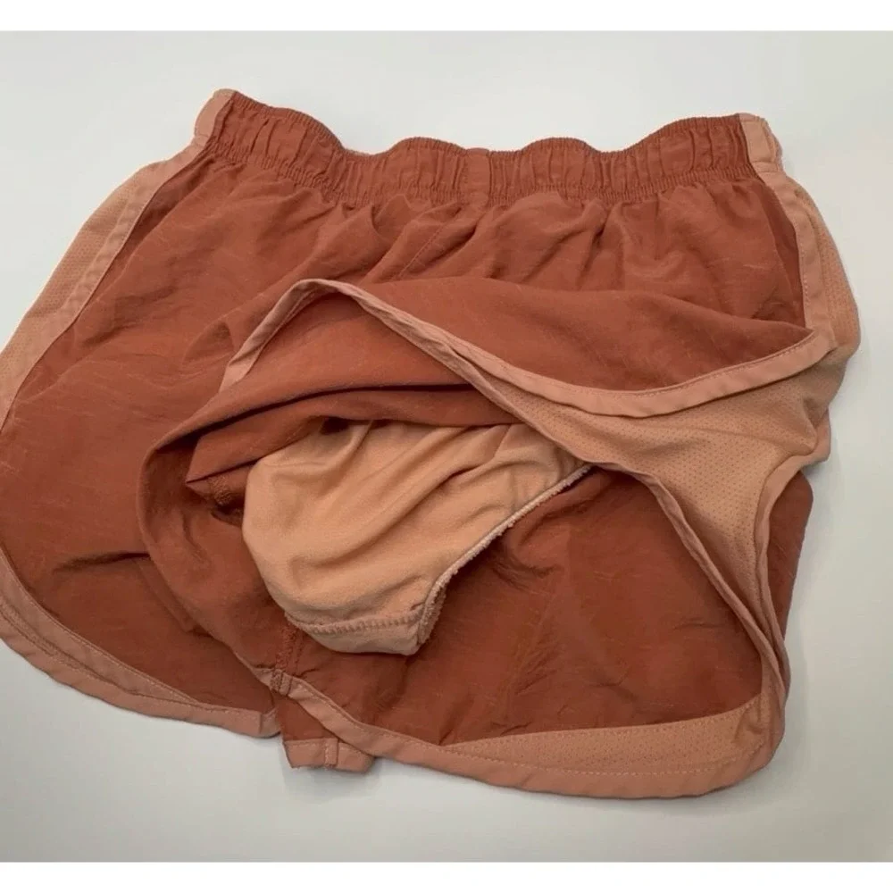 Women's size MEDIUM NIKE Dri-Fit athletic shorts.  EUC.